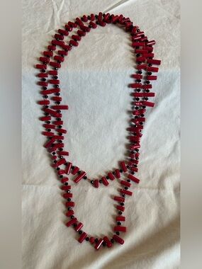 Hand crafted Red Agate and black beads on red silk thread